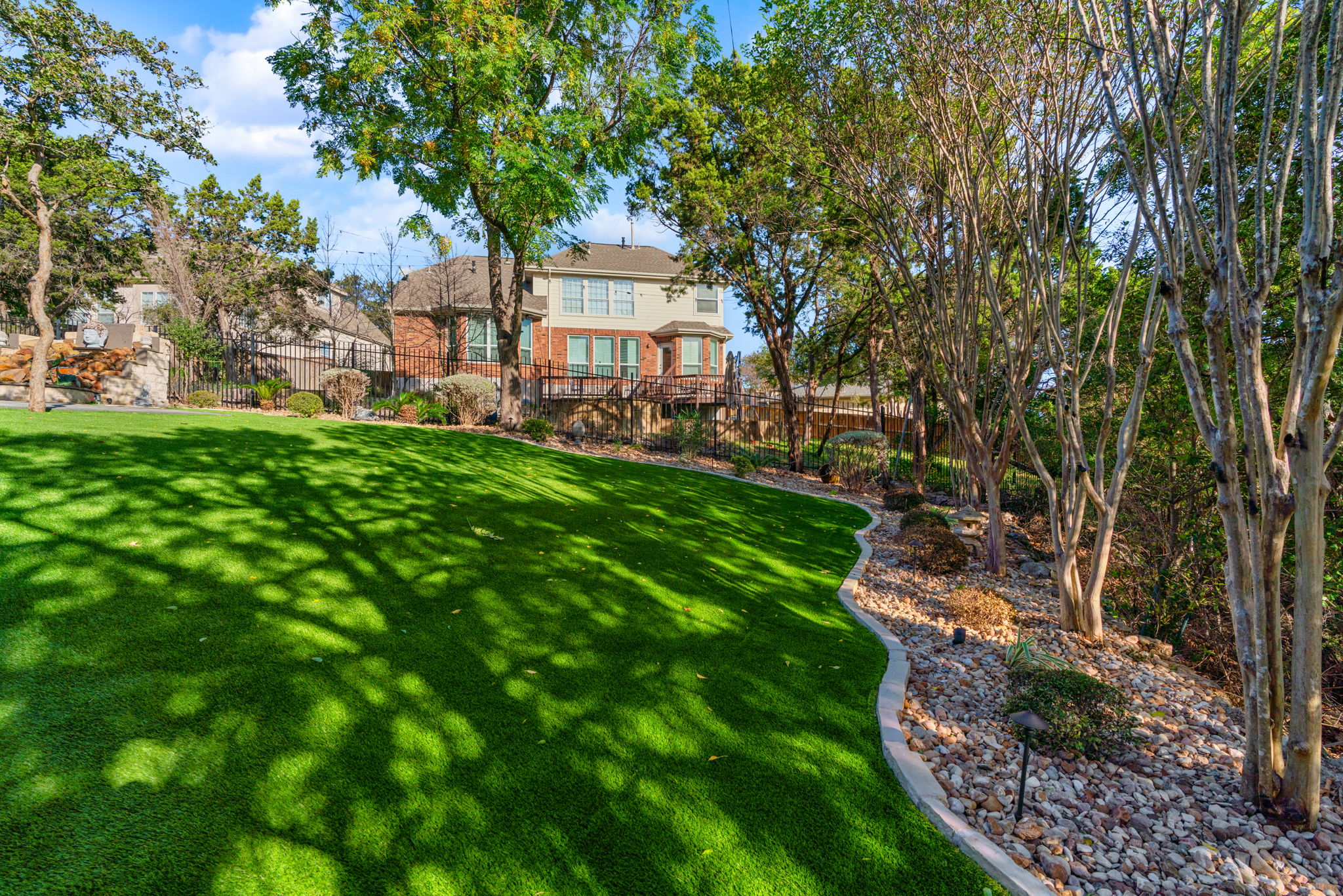 Southern Love's artificial turf services make fall landscaping a breeze. Enhance your home's curb appeal and enjoy a hassle-free lawn.